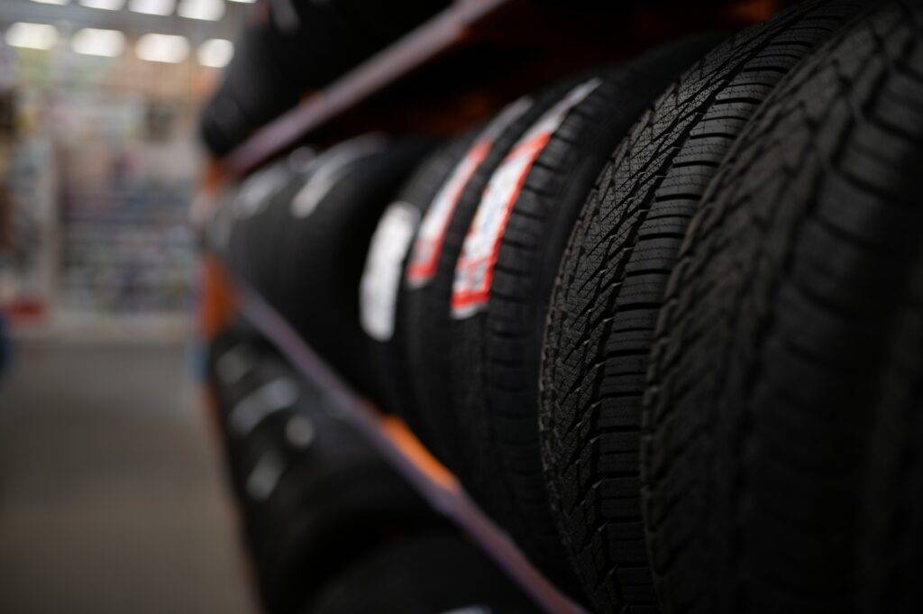 Car tires at warehouse in tire store